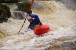 Charging down the river Dart in the Riot Thunder